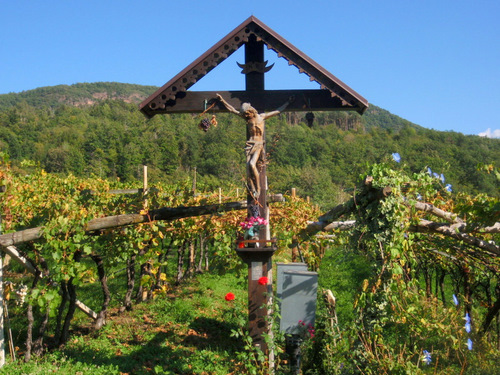 A break next to a small shrine to Jesus.